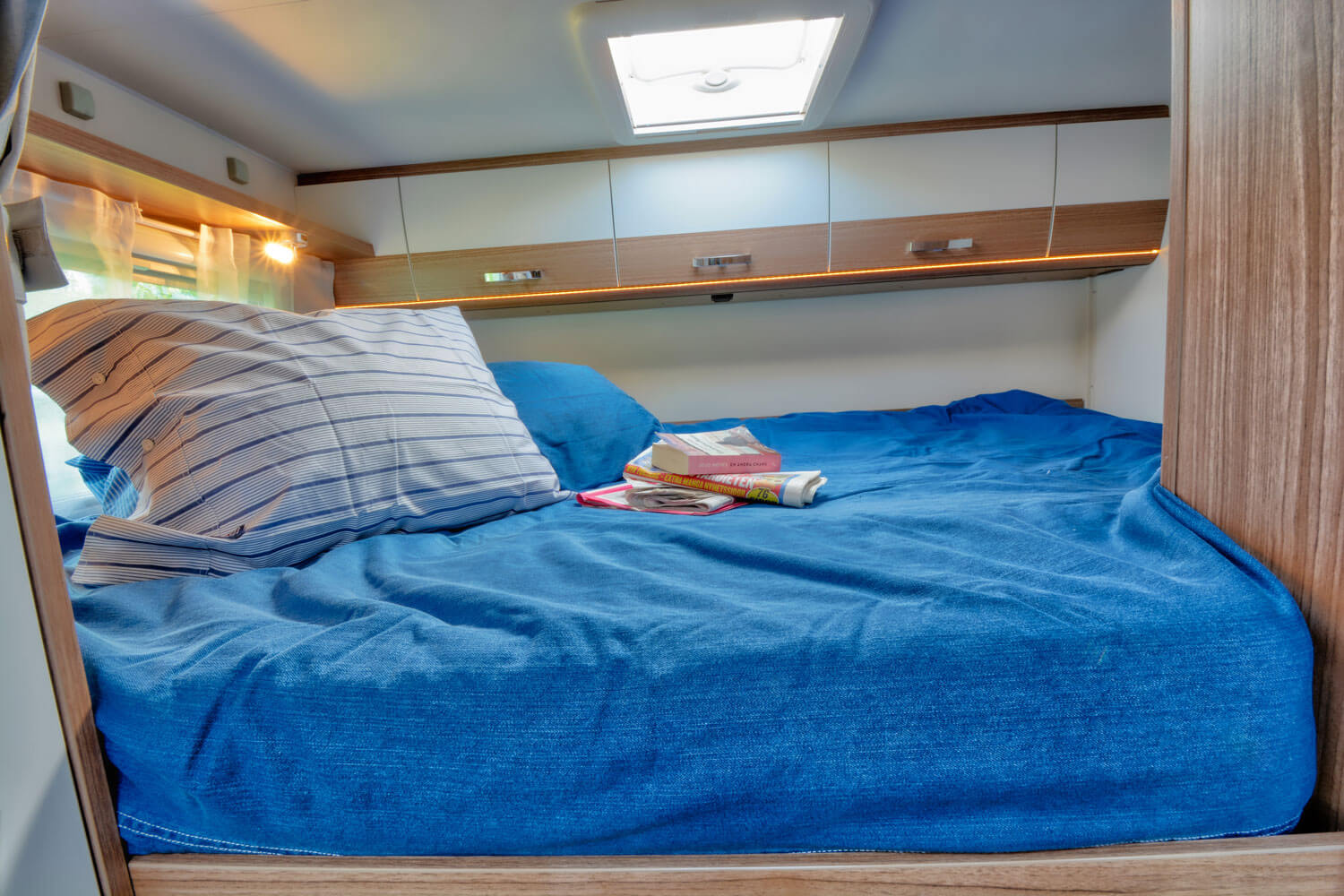SkandiTrip family luxury motorhome doublebed in the back of the vehicle